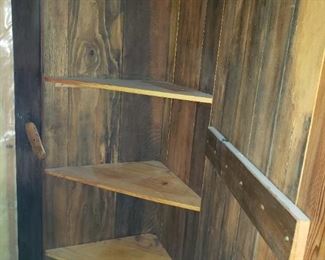 Inside of large barn wood corner cabinet