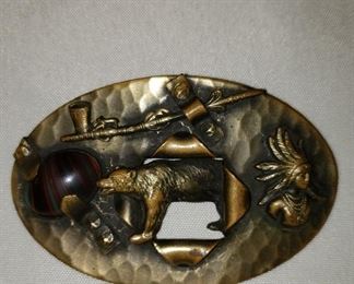 Vintage pin (about the size of a small belt buckle)