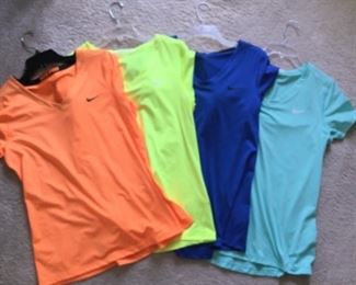Like new, ladies Nike shirts.