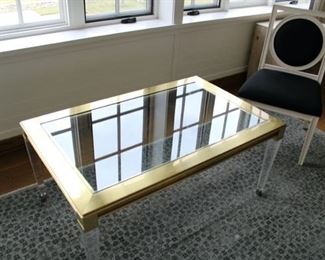 Brass and glass table with lucite legs. $1,500 REDUCED TO $600!!! 