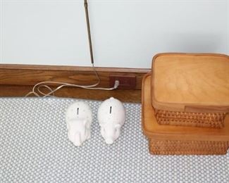 Piggy banks by Tiffany & Co. $125 each. Rattan and wood baskets: Large $35, Small $25