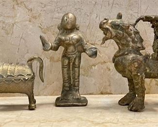 Item 402:  Brass Donkey (left) - 2.5":  $28                                                                                                               Item 403:  Brass Metal Figure (center) - 2.5":  $28                                                                   Item 404:  Brass Foo Dog Candlestick - 2.5":  $28
