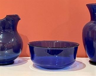Item 164:  Lot of 3 Items: $28                                                                                                    a.  Cobalt Blue Pitcher - 9":                                                                                   b.  Cobalt Blue Bowl - 9" x 4":                                                                                                              c.  Cobalt Blue Vase - 5.25" x 11": 