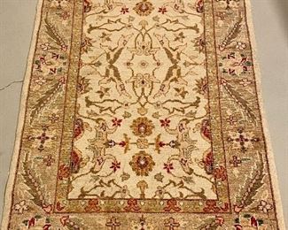 Item 277:  Ivory and Tan Rug with Rust Color Accents - 36" x 61":  $350