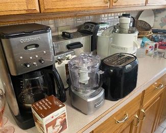 Small appliances- coffee pot. Chopper, toaster, can opener, juicer, euro pro fryer, waffle iron