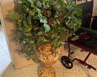 Antique pitcher urn with greenery