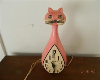 Pink cat clock
