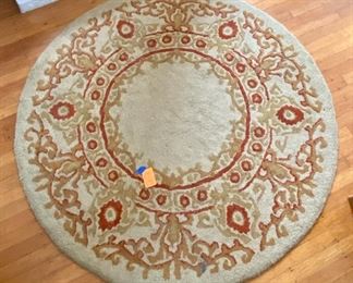 22.	Round rug 54”D hooked cotton 				$40 