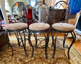 32.	Three metal barstools 17”W x 29”H to the seat & 46”H 	$75 
