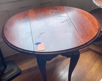 40.	Drop leaf small table 28”D x 45”L with leaves up x 2’H	$80 