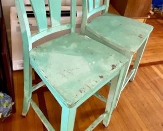 44.	Pair of turquoise bar stools 					$50