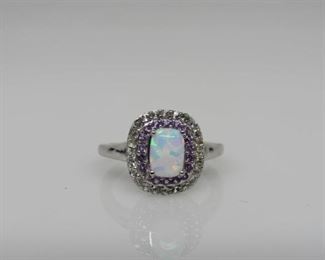 Stone: Ethiopian Fire Opal
Type: Ring
Weight (ct): 0.8 ct
Metal: Sterling Silver
Size: 6
Located in: Chattanooga, TN