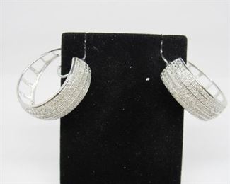 Stone: Diamond
Type: Earrings
Weight (ct): 2 ct
Metal: Rhodium Plated Over Brass
Located in: Chattanooga, TN
Hoop Style
KWJ4-2
