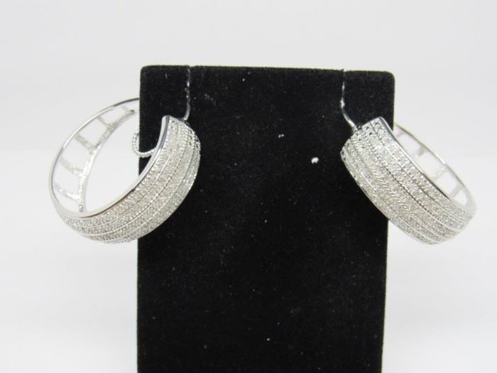 Stone: Diamond
Type: Earrings
Weight (ct): 2 ct
Metal: Rhodium Plated Over Brass
Located in: Chattanooga, TN
Hoop Style

KWJ4-2