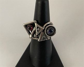 silver ring acid tested not stamped - size 6 1/2 stones unknown - price 200 dollars  