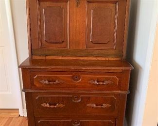 	#10	Mid to late 1800s antique dropdown secretary w/ 3 drawers on casters 34"x21"x63"	 $175.00 		