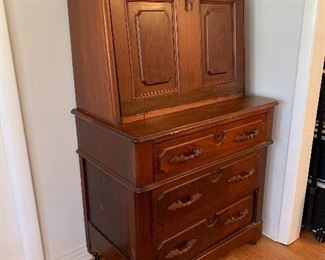	#10	Mid to late 1800s antique dropdown secretary w/ 3 drawers on casters 34"x21"x63"	 $175.00 		