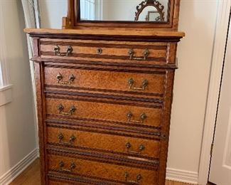 	#20	Antique Victorian birdseye maple dresser from late 1800s with 6 drawers, with a hinged side to lock the 5 bottom drawers. 34"x22"x68". As is-missing veneer	 $175.00 		
