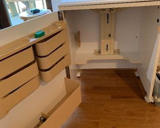 	#32	Sewing cabinet on wheels. As is-loose hinge.	 $25.00 		