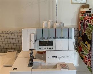 	#33	PFAFF Coverlock 4872 serger with sewing cabinet on wheels	 $200.00 		