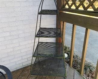 	#45	Wrought iron tired stand 46'H	 $30.00 		