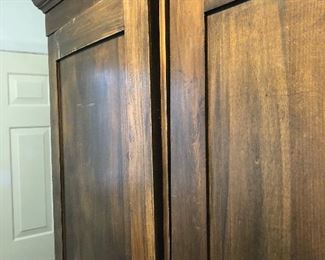 #67 Armoire/storage cabinet 50 x 21 x 83.  "As Is" left door warped at top.  (see pics.). $100
