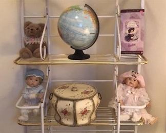 Great metal white bakers rack, girl and boy dolls, fun world globe, collectible Barbie doll, wooden hat box. And other dolls