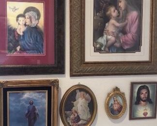 Many religious pictures and items at this home