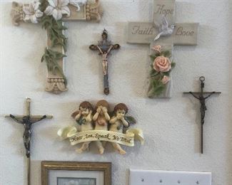Lots of beautiful crucifixes crosses and religious pictures for your wall