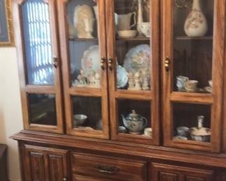 China cabinet sold separately but coordinates with the dining room table and eight chairs