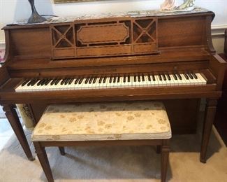 Beautiful upright piano and bench