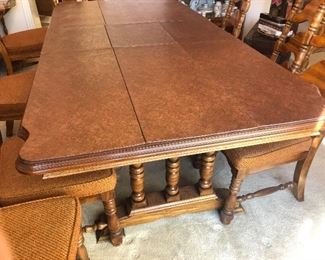 Dining room table with custom padding on top