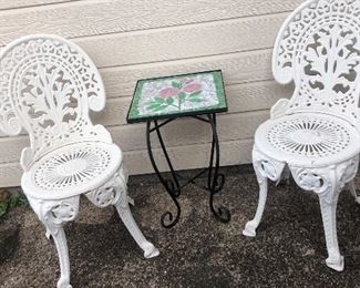 Wrought iron chairs and pretty patio table