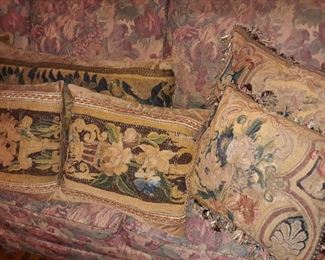 Throw pillows made from antique Persian rugs