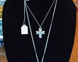 James Avery Sterling Silver Cross necklace and a Jade Mayan Warrior and sterling silver pendant necklace.