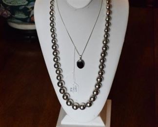 Sterling Silver bead necklace and a sterling silver and onyx necklace
