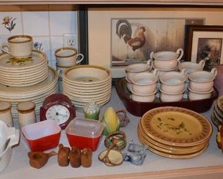 Various kitchen wares including vintage Pyrex, Corningware, and Mikasa stoneware.