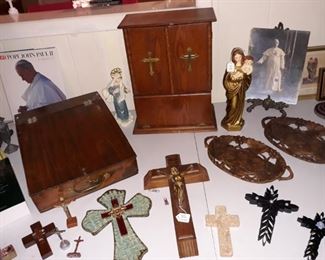 Religious items including a travel last rites box with contents, last rites crucifix, crosses, figurines, lap desk, Huggler wood trays, and a 1924 photo of the Pope.