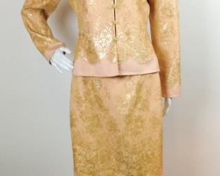 Lot	9	Bill Blass Ornate 2pc Peach Suit Skirt	Bill Blass Ornate Gold Embroidered and Sequined Trim Knotted Buttons 2 piece Peach Suit Skirt (approximately measures women's 8 )
