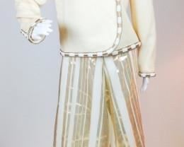 Lot	18	Designer Carolina Herrera 2 Pc. Suit Skirt Set	Designer Carolina Herrera 2 Pc. Suit Skirt Set Skirt 100% Silk with Gold Lame Vertical Strips Jacket 100% Wool Hidden Snap Closure = Flat Front Collar - Cuff - Bottom Jacket Trimmed in tiny Pearl & Golden Thread Size 8 - (skirt not hemmed)
