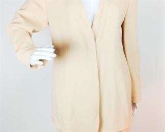 Lot	23	Giorgio Armani Buttercup Wool Skirt Suit	Giorgio Armani buttercup color Wool Skirt Suit Two hidden button front Jacket Pencil SKIRT back zipper closure No Sizing - other items from this collection are size 40
