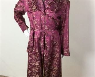 Lot	34	Vintage Custom Creation Baroque Violet Kimono	Vintage Custom Creation Baroque Violet Kimono Crafted in Traditional Style - Ribbed Collar & Cuffs Knotted Ornamental Fasteners No Sizing - Measures Approximately. 26" around waist when fastened Condition - some tears in lining at collar and right arm and on lower left
