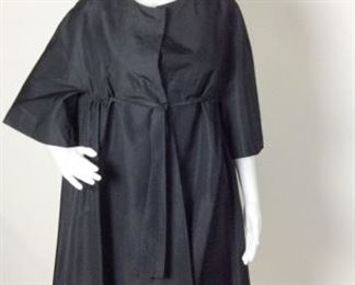 Lot	36	Custom Creation Kimono Style Satin Jacket	Custom Made Creation in China ( while performing ) Kimono Style Satin Jacket - Dark Burgundy Lining Tie Front - 3/4 Sleeve - Pleated Back No Sizing about a small or medium
