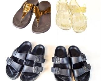 Lot	40	4 Pairs of Women's Sandals	2 pairs of black Birkenstocks, lightly worn, EU size 38 US size 7-7.5 1 pair of brown sequin Flip Flop platforms, US size 7 1 pair of clear Emilio Pucci closed toe sandals, EU size 37/38 US size 7
