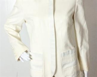 Lot	60	Valentino Boutique 2 Texture Skirt Suit	Valentino Boutique 2 Texture IVORY Skirt Suit SIZE 10 Skirt side zipper closure Jacket zipper front two pocket three pearl - like buttons each sleeve Condition - stain right front shoulder - spots right sleeve by buttons - lipstick front middle trim - stain left back of shoulder - right shoulder dots behind right pocket dot stain
