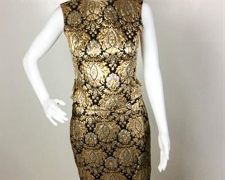 Lot	77	Vintage Lord & Taylor Baroque Gold /Silver 2 pc.	Vintage Lord & Taylor Baroque Gold /Silver Two Piece Lame Set Skirt with Sleeve-Less Top - Satin Lined No Tag with sizing - similar to a women's 6 )
