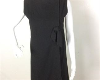 Lot	81	Vintage Suzy Perette New York Black Dress	Vintage Suzy Perette New York Black Dress Hidden Closure Front - Knotted Tie Ascent Length from top to bottom - 37" SIZE 8
