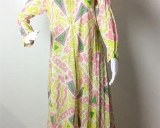 Lot	85	Vintage Pucci Design Travel Lite by Boutique	Vintage Pucci Design Travel Lite by Boutique Loungewear Zipper Front Long Dressing / Lounging Gown Size Small - Coloring = Citron / Pink / Green / Lavender Condition - tear right sleeve - on right cuff, some stains and holes in bottom hem.
