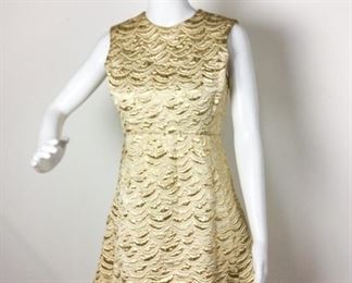 Lot	90	Vintage Suzy Perette New York Jacquard Dress	Vintage Suzy Perette New York Golden Gold Metallic Jacquard Sleeveless Dress - Long Zipper on Back ** NO SIZING ** Measures Approximately 36" long - 28" around waist - across bust 17" [Guessing from collection contents size 8 ]
