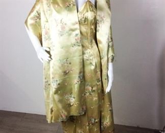Lot	108	Custom Creation Oriental Gown & Wrap	Custom Creation Oriental Golden Baroque Gown & Wrap Sleeve-Less - Spaghetti Strap Gown Wrap is 19 " x 92" - Pleated slit left side 15" bottom - up ****NO SIZING ***** Measures Approx. 28" around waist
